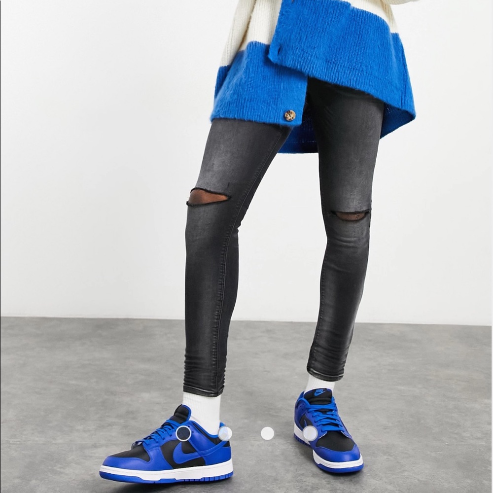 ASOS DESIGN Mens spray-on jeans with power stretch in washed black w/knee rips